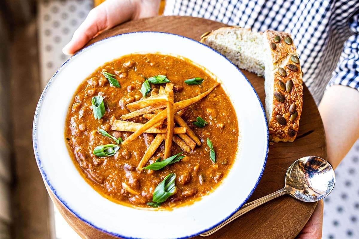 a bowl of pumpkin flavored chili