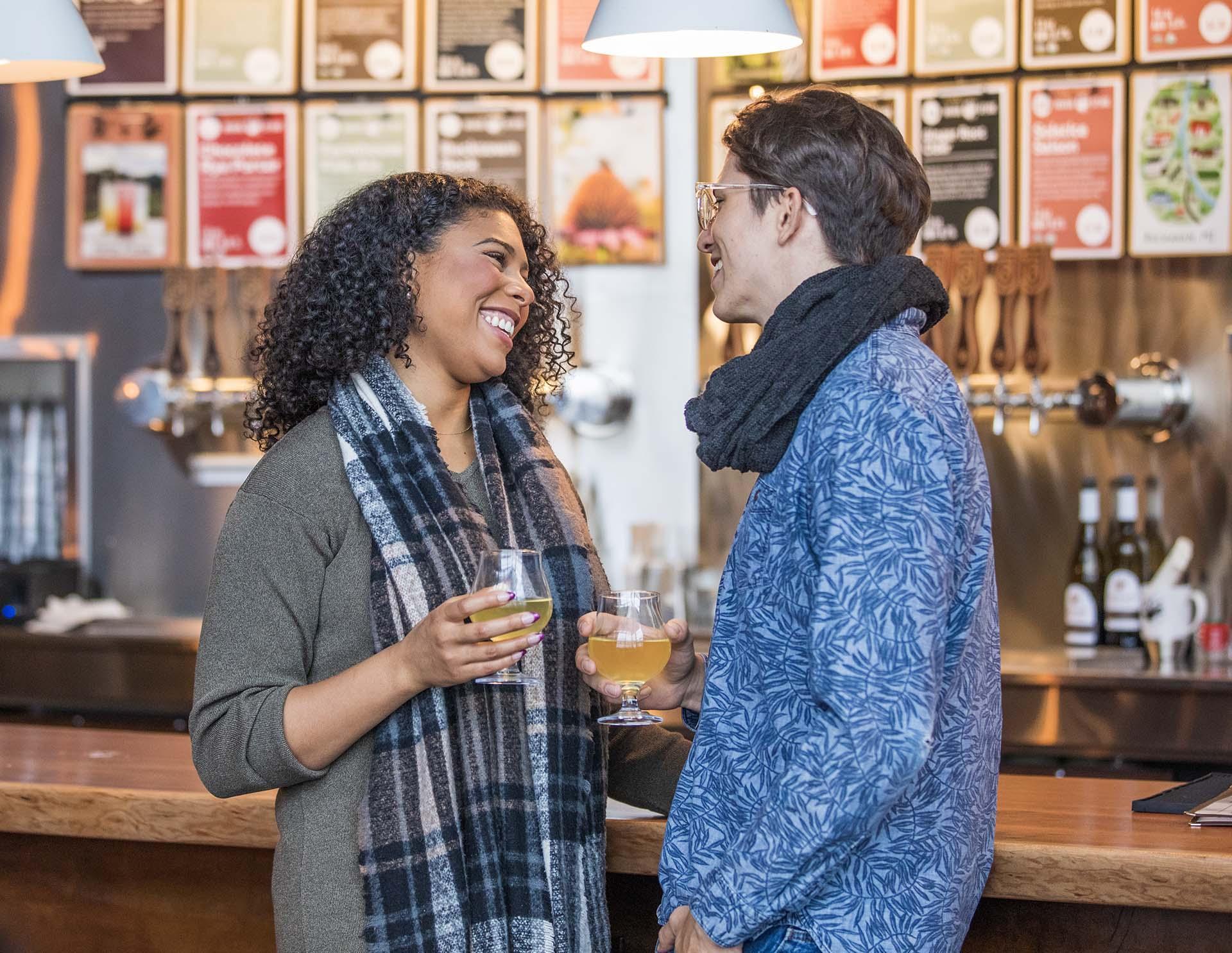 A couple enjoying drinks at River Saint Joe.