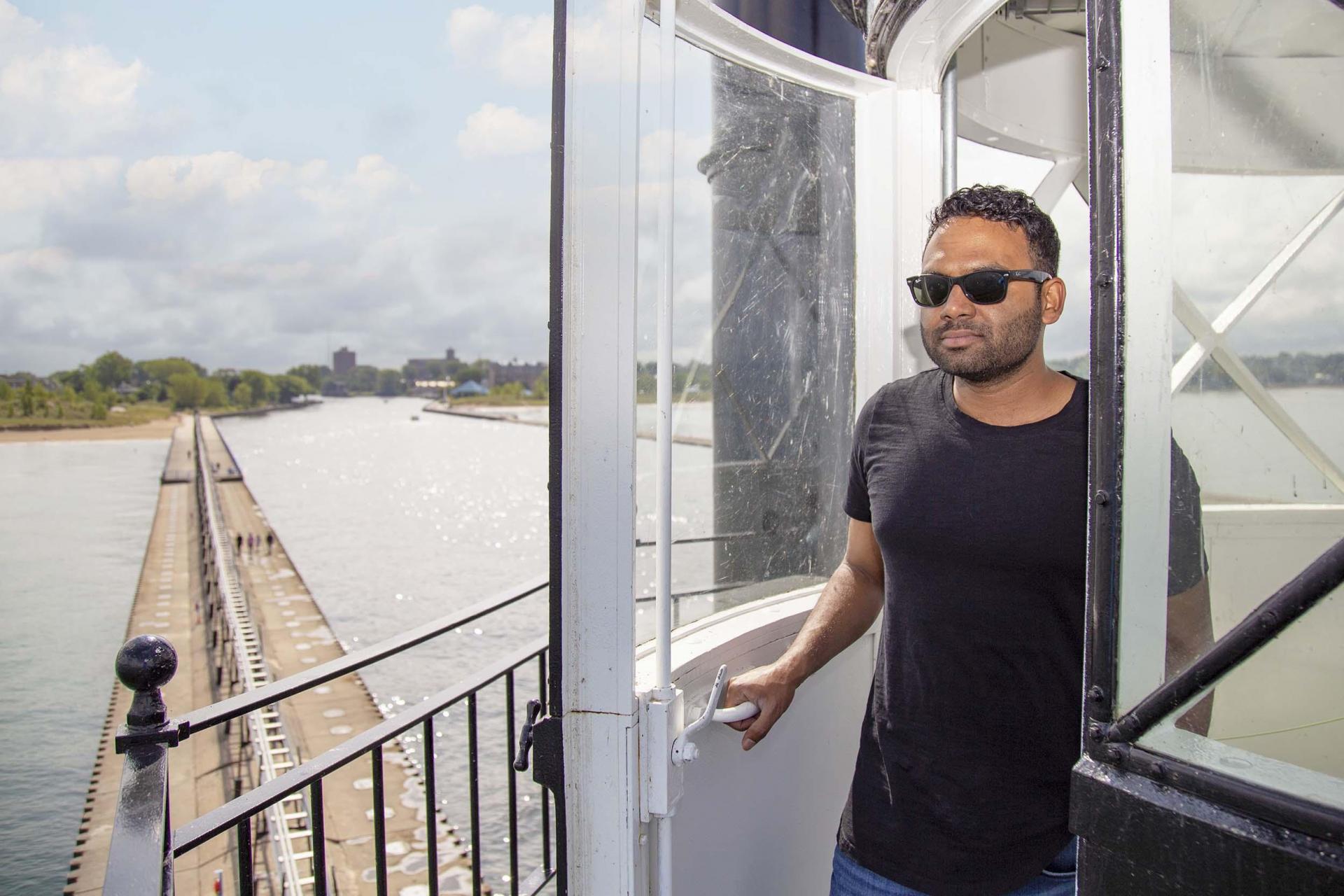 A person on a tour of the lighthouse in Saint Joseph, MI.