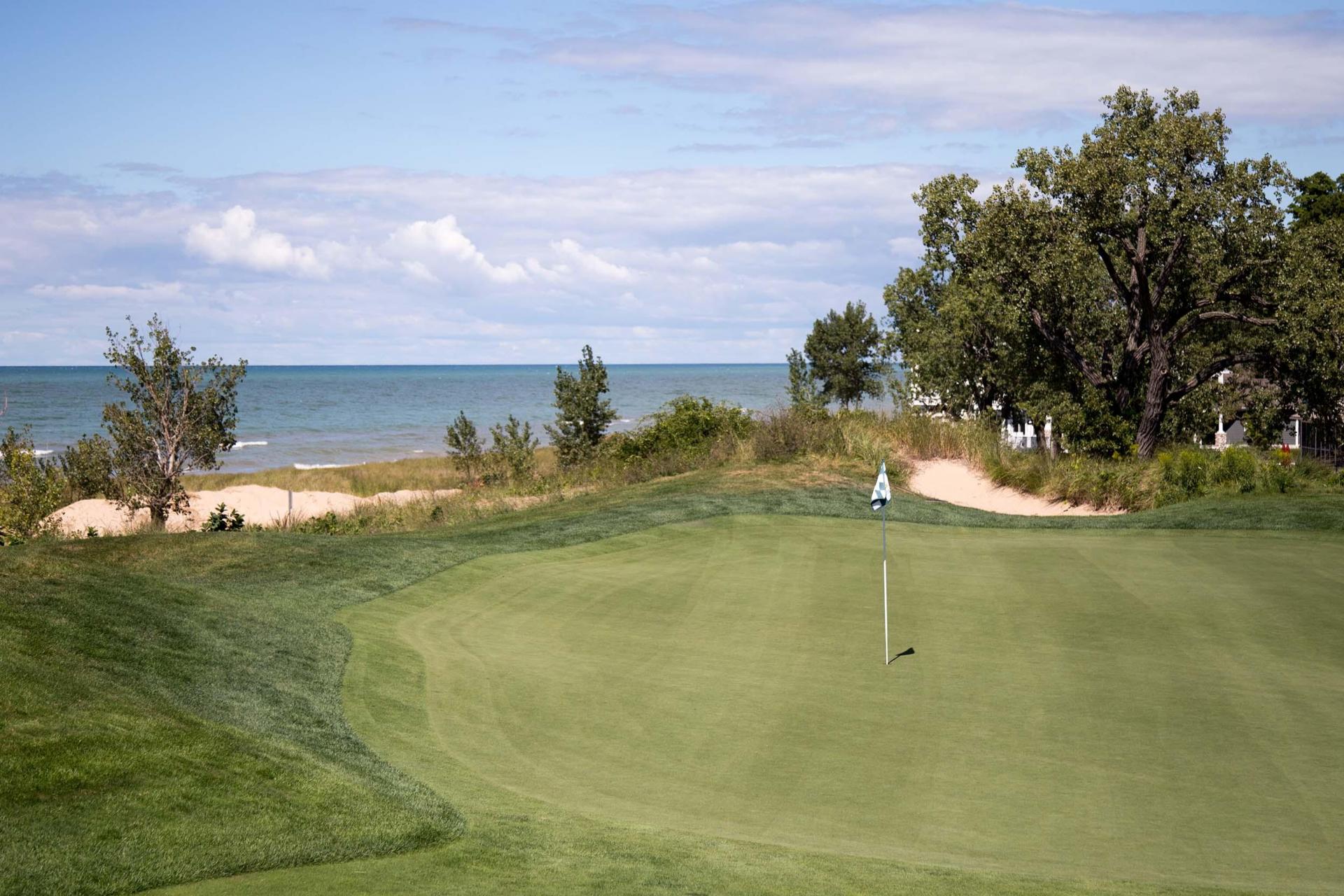 Golf green with a view of Lake Michigan.