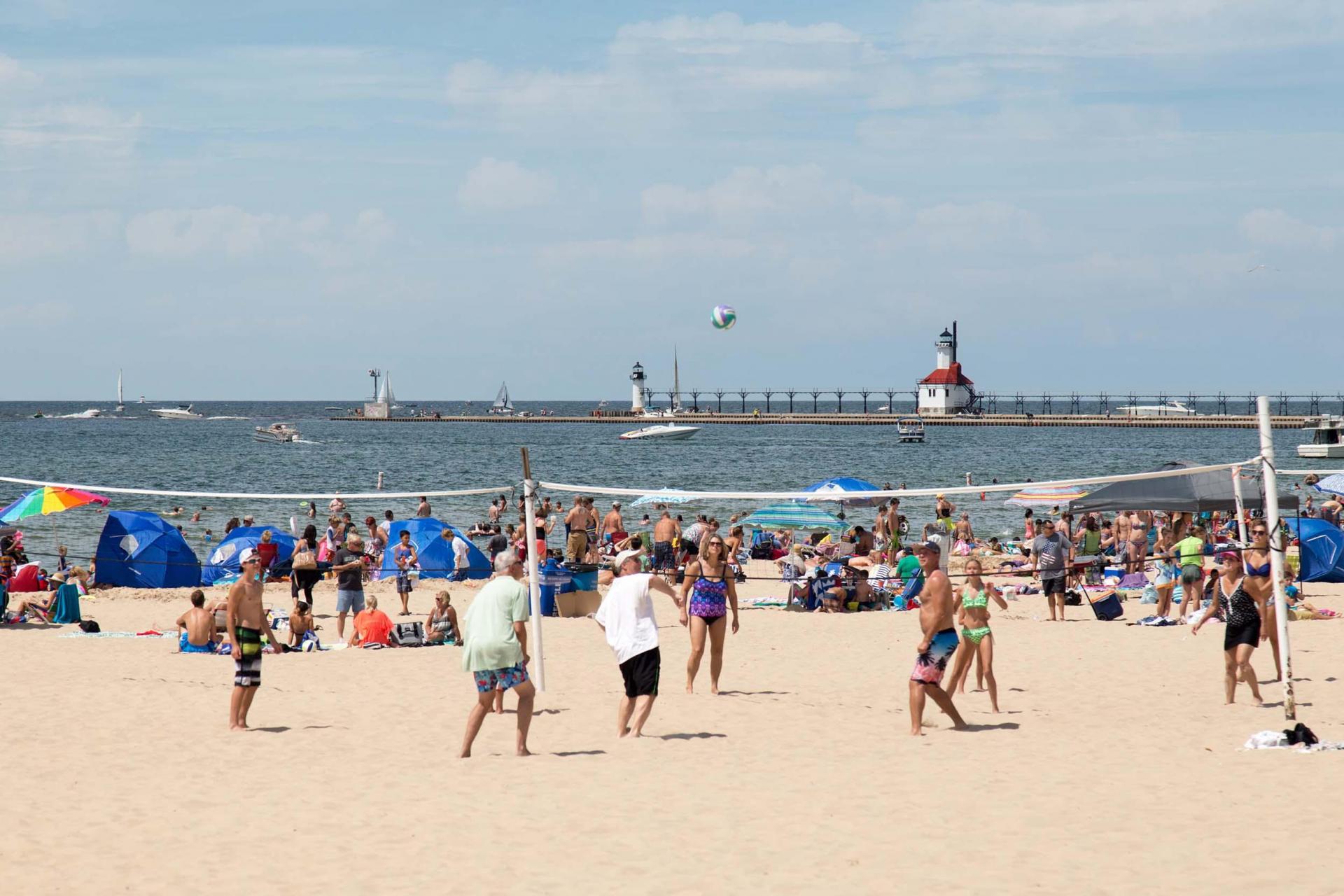 People playing volleyball at Silver Beach.