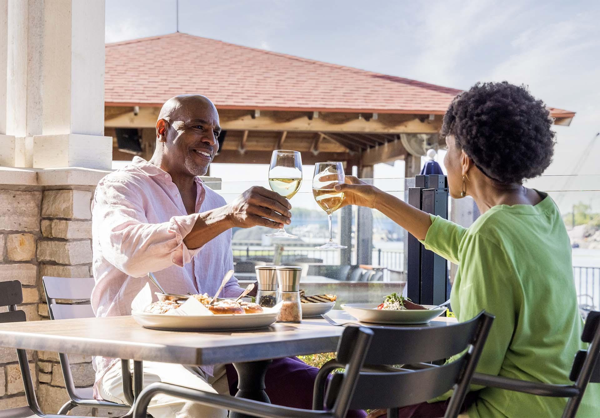 A couple enjoying a meal at Planks