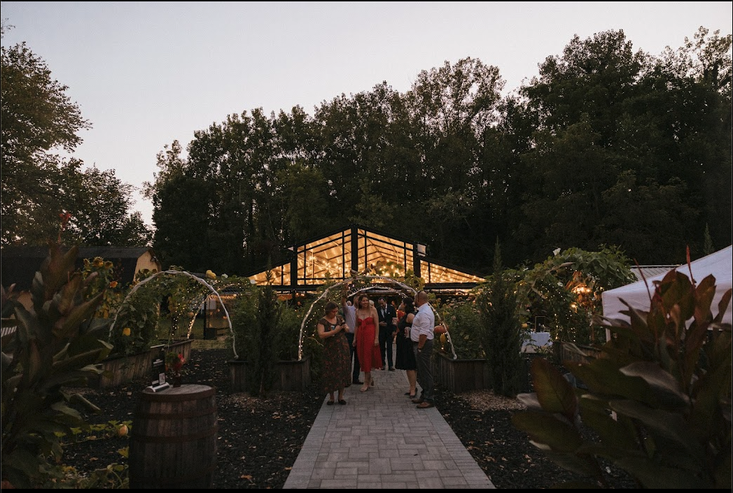 Cocktail hour winds down on the courtyard as guests walk through the hanging gardens as reception begins