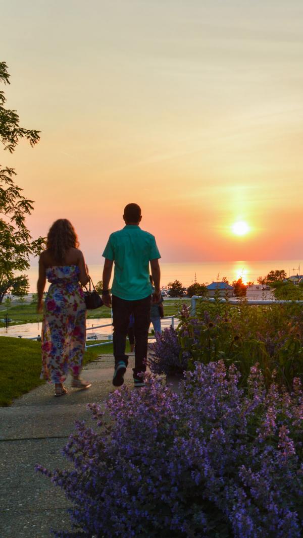 Couple walking at sunset