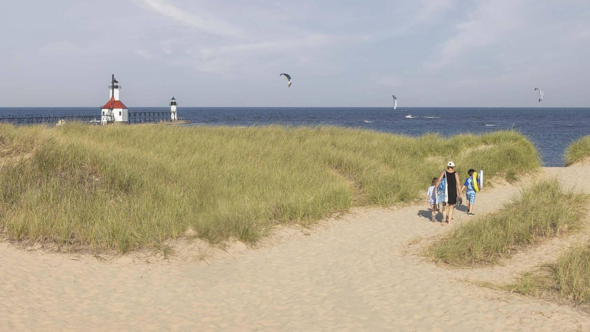 People Walking On Beach