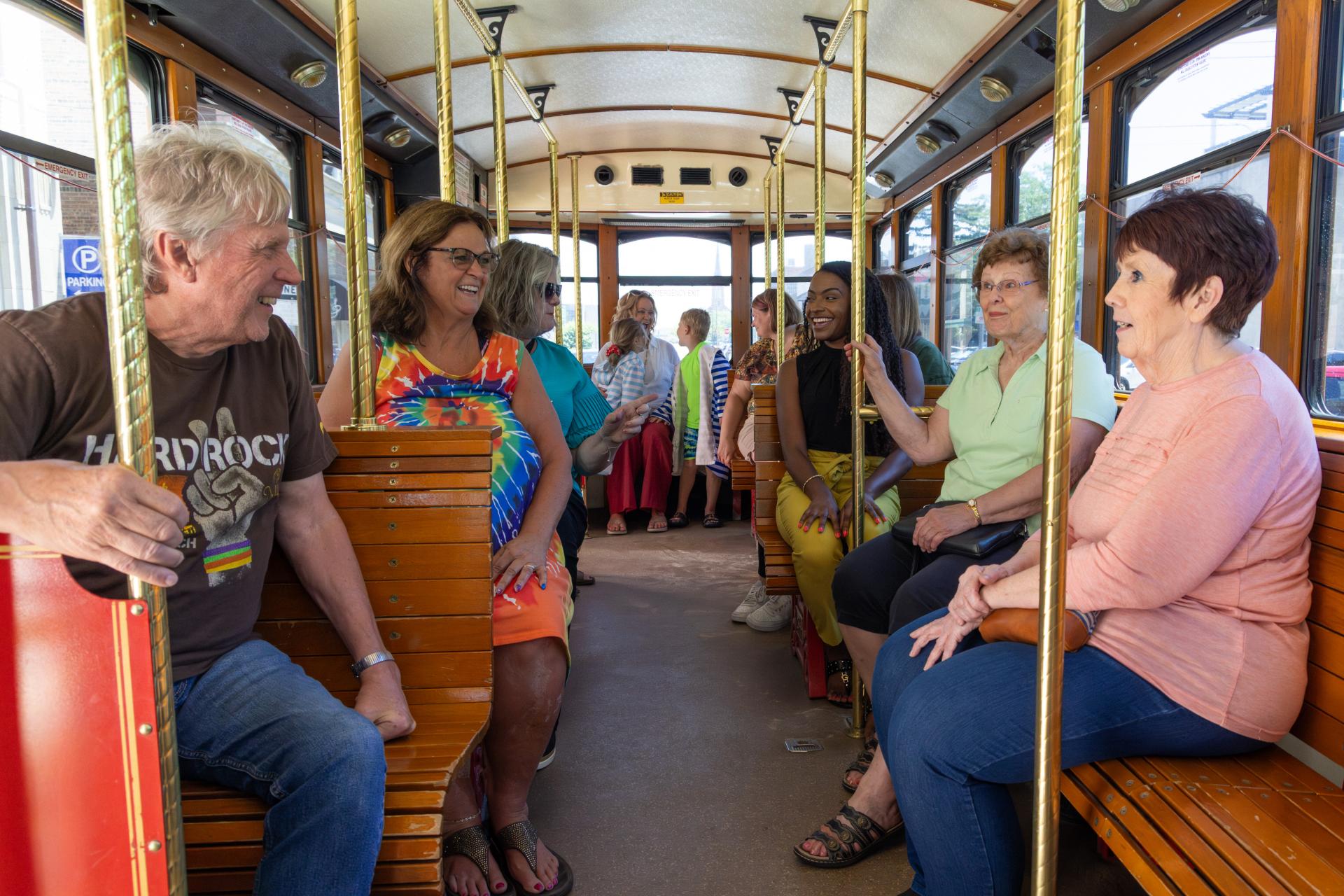 People on the shop and shore trolley