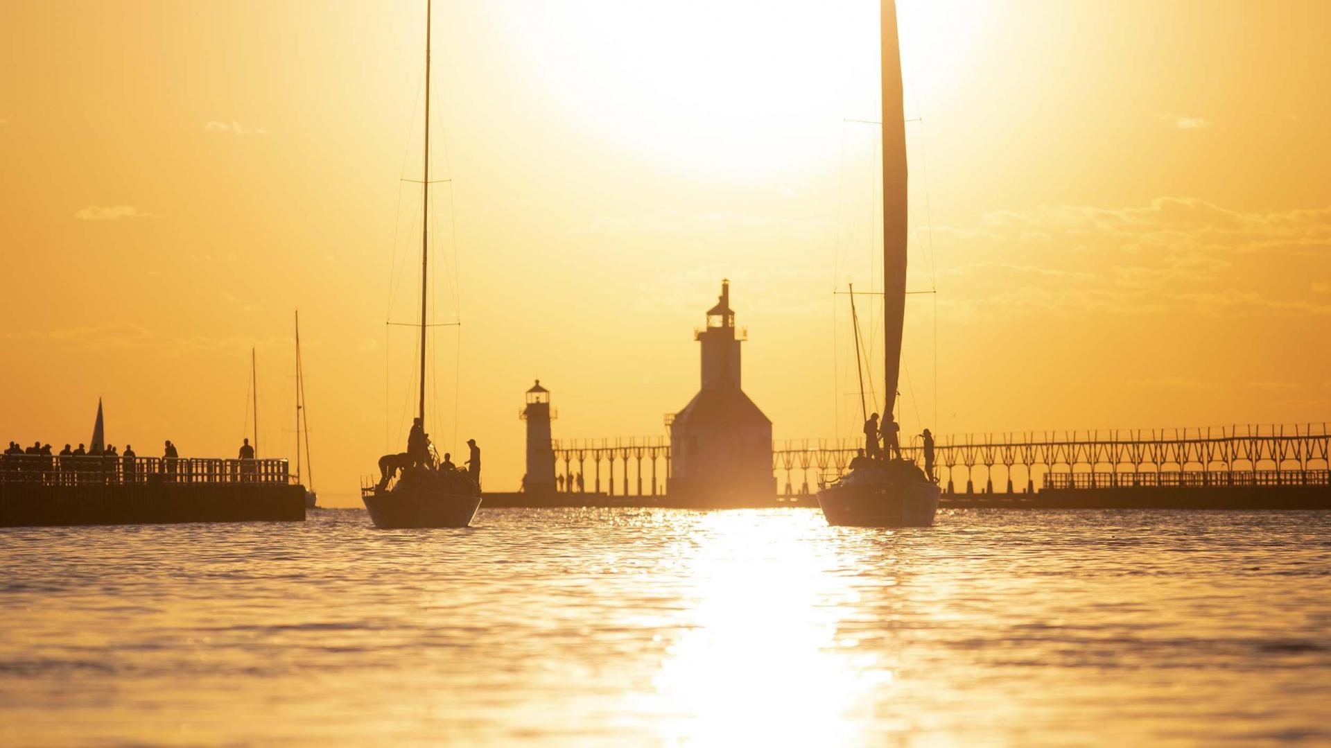 Summer sunset with sailboats.