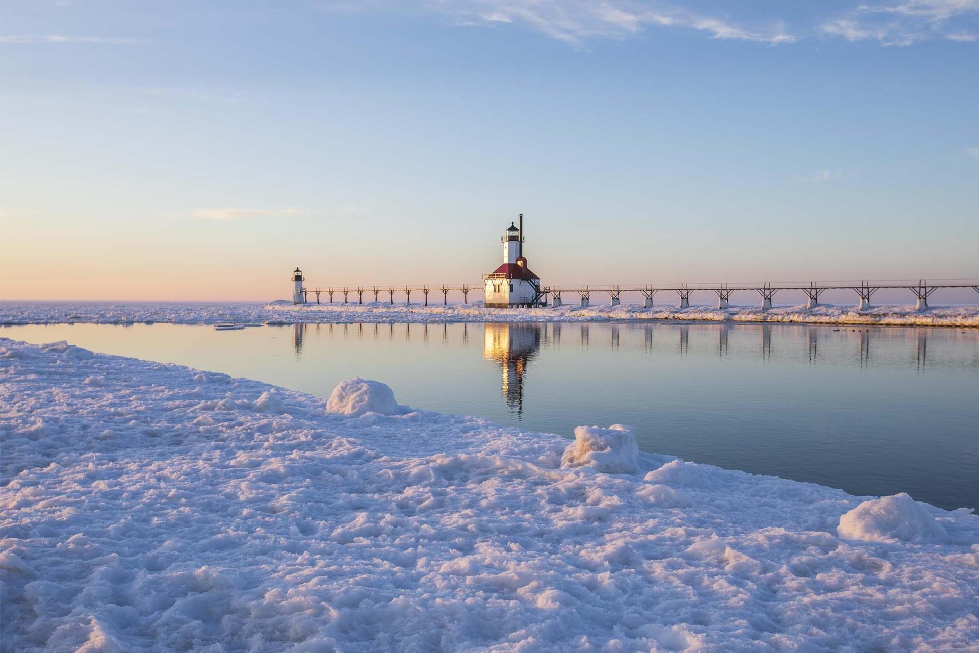 A winter view of the lighthouse in St. Joseph, Michigan just before sunset.