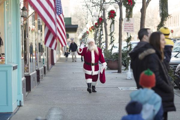 Santa Walking on Sidewalk in Downtown St. Joe