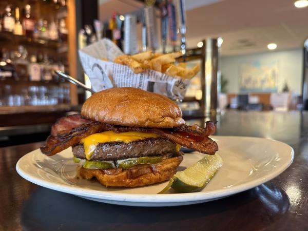 Burger on Plate with Fries and Pickle