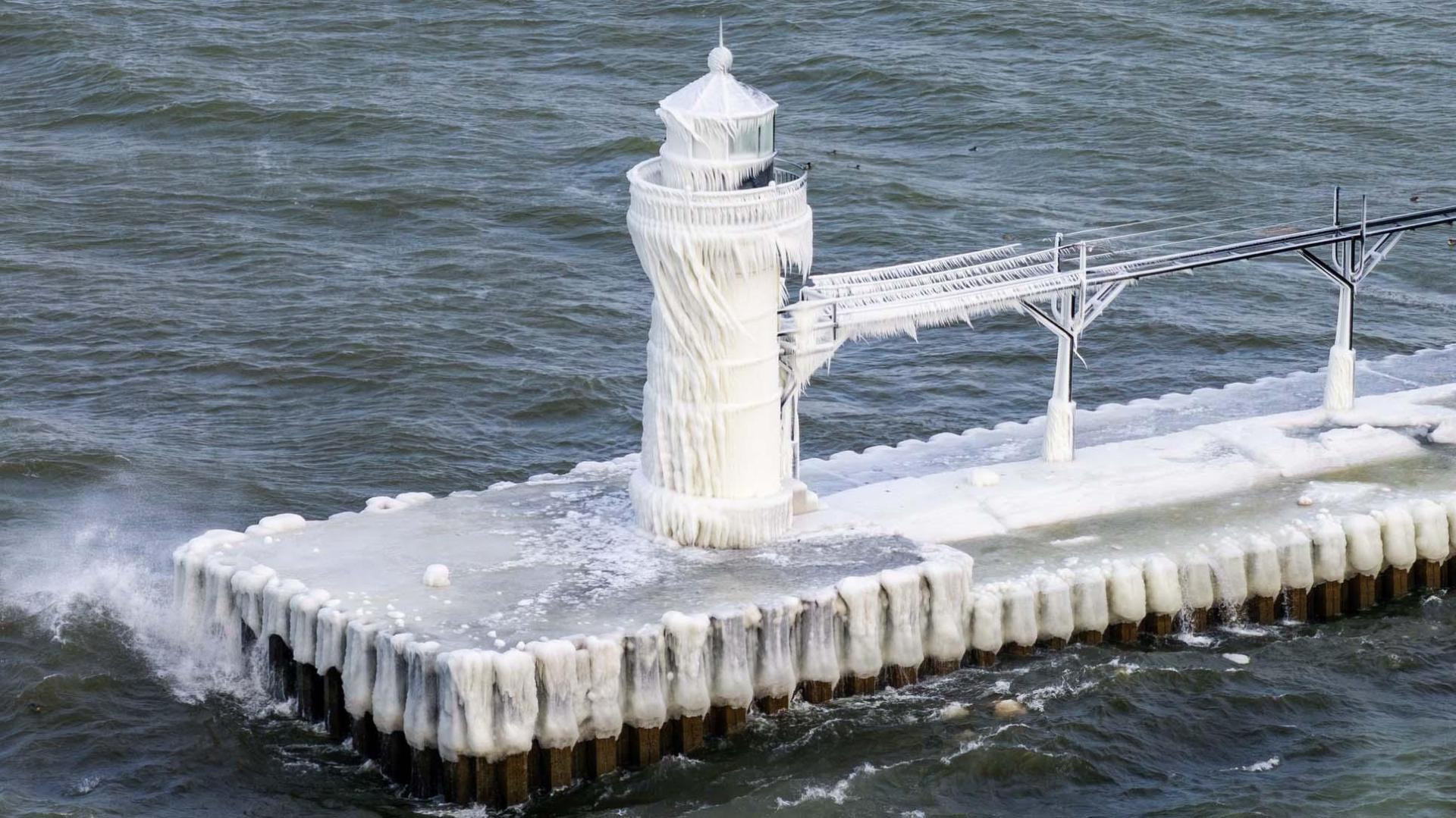 A drone view of the ice covered lighthouse in St. Joseph, MI. 