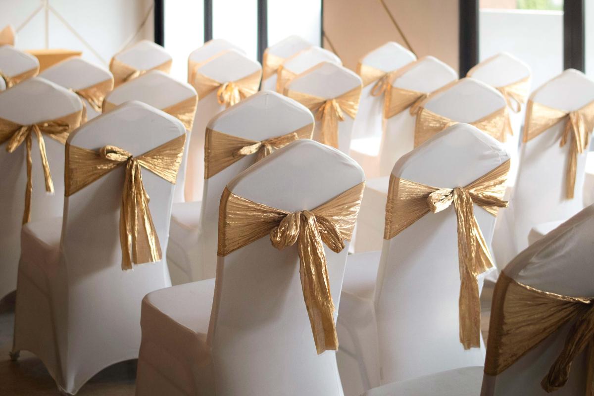Elegant chairs available to rent for a wedding.