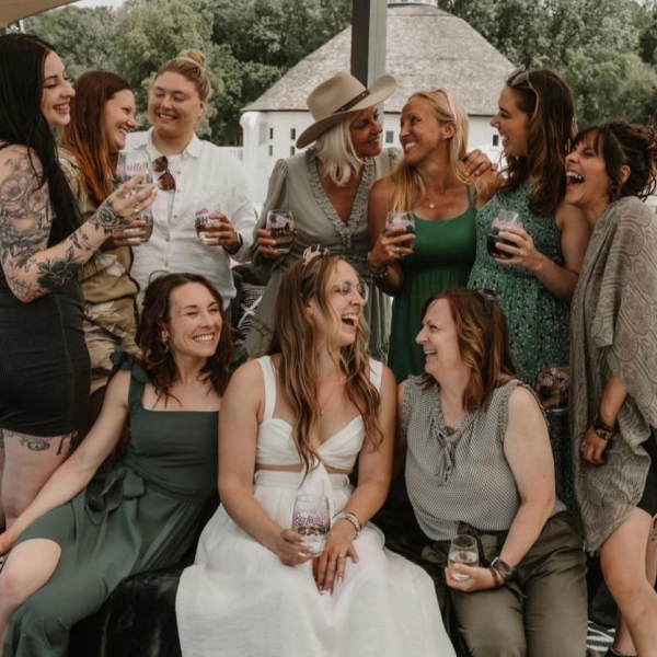A group of women celebrating a bachelorette party at Round Barn Winery