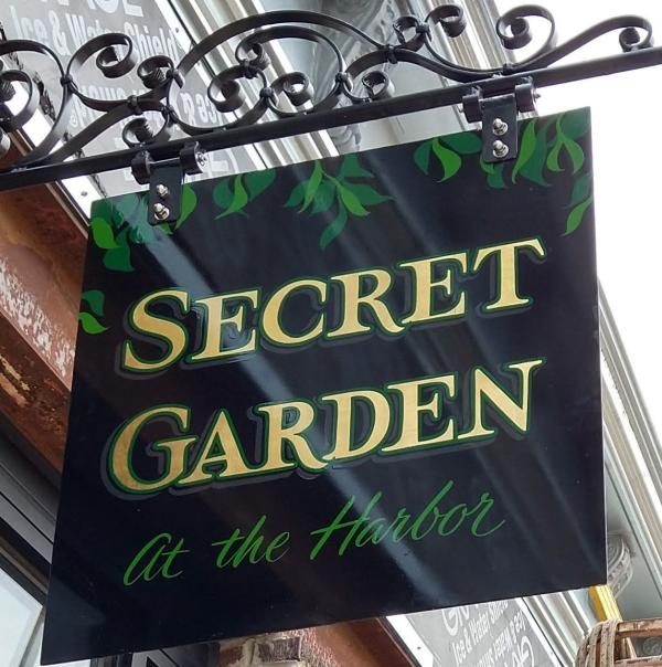 Secret Garden at the Harbor logo