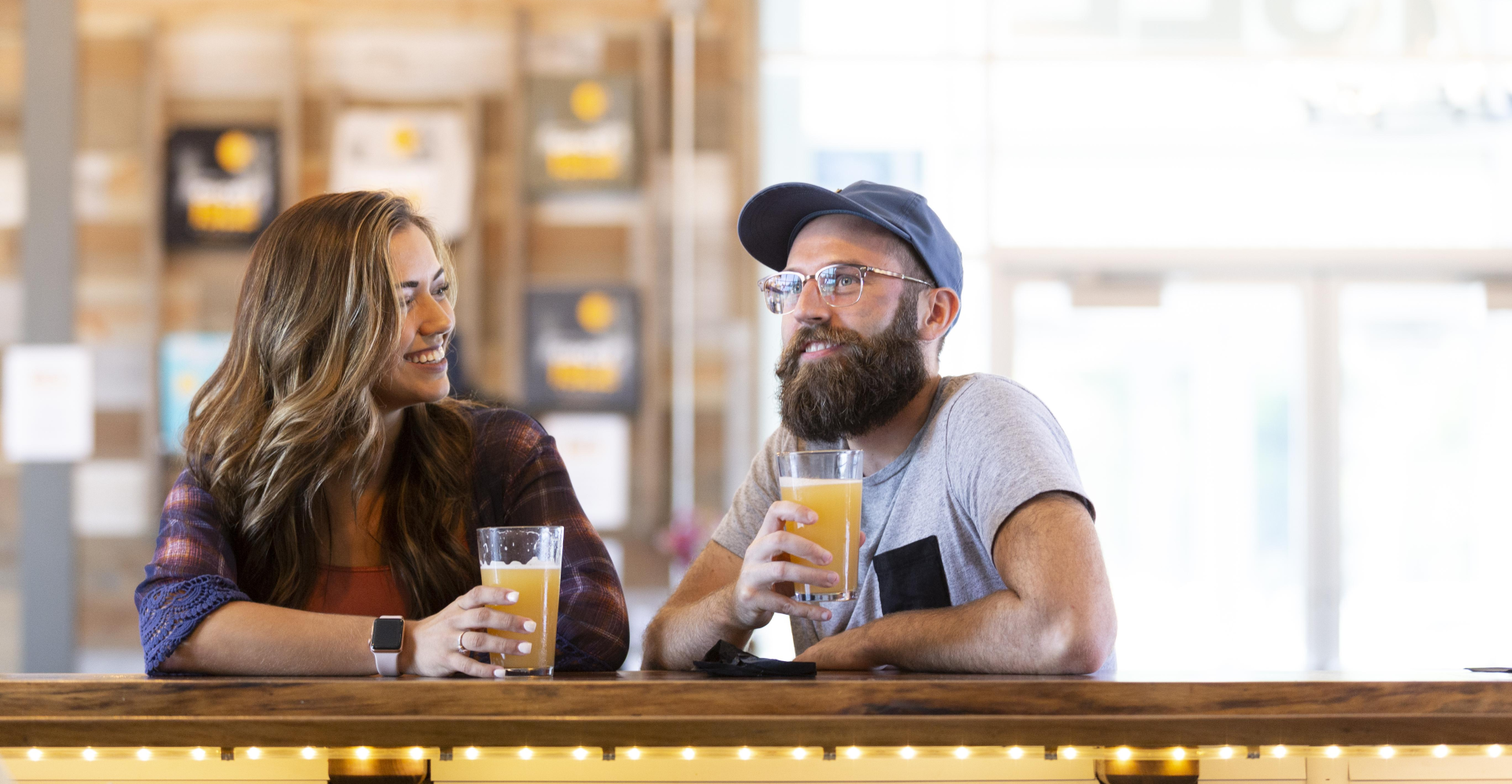 Couple enjoying drinks at a Makers Trail location