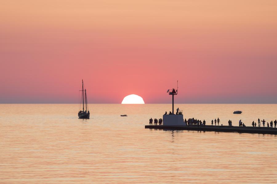 Tall Ship MJ on Lake Michigan at sunset.