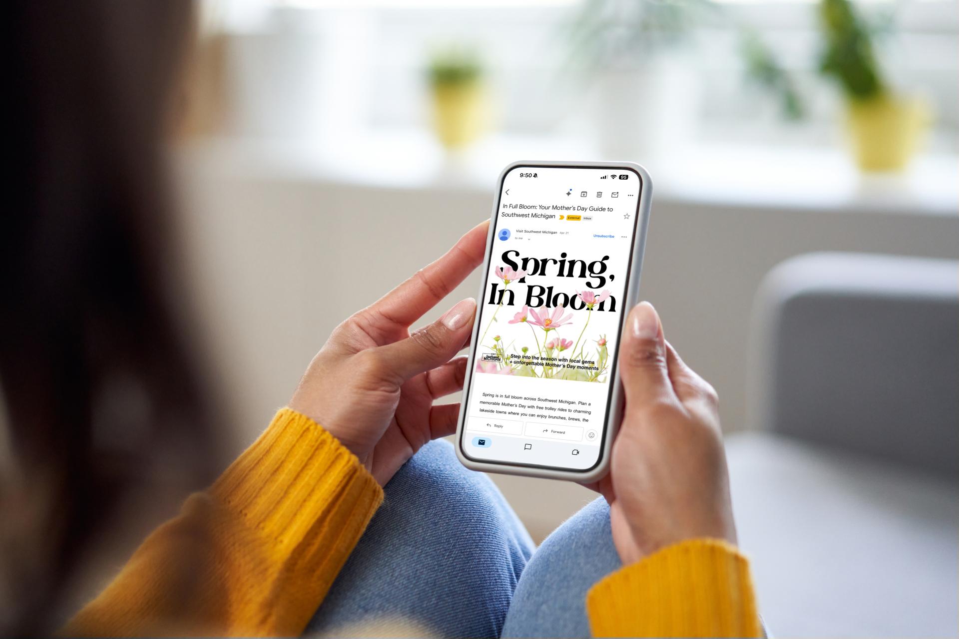 Person browsing VSM website on phone