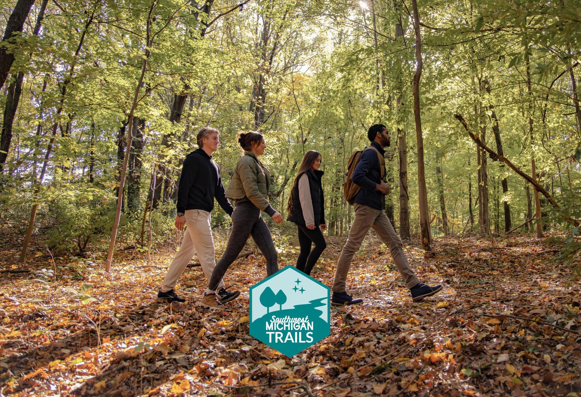 A group of friends hikes the Mt. Tabor Trails together.