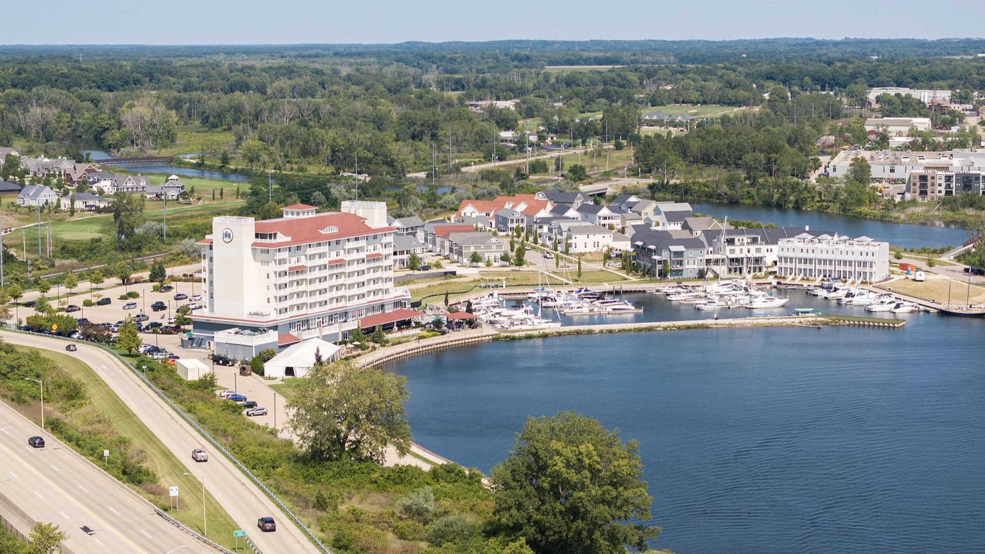 A view of The Inn at Harbor Shores with fall color.