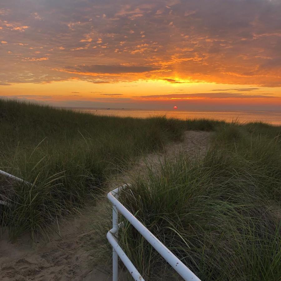 A vibrant sunset over Jean Klock Park in Benton Harbor, Michigan.