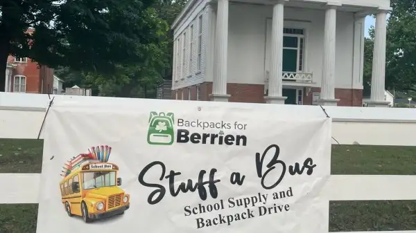 courthouse with stuff a bus banner