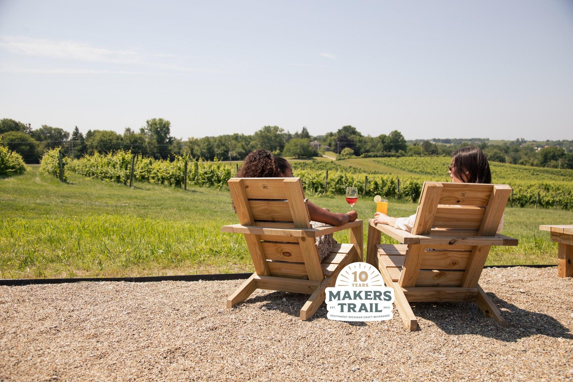 Two people enjoying a drink on the makers trail