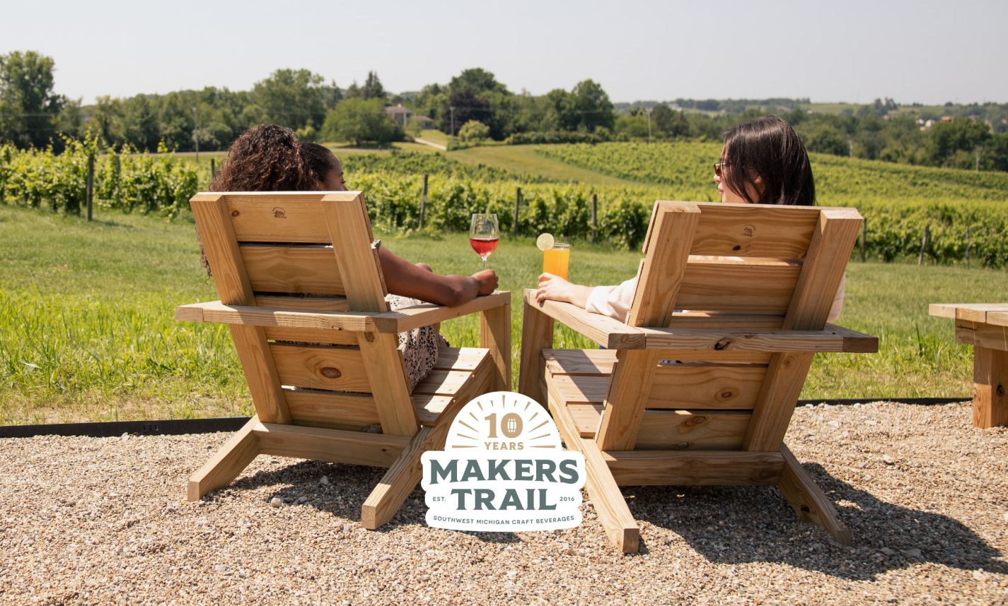 Two people enjoying a drink on the makers trail