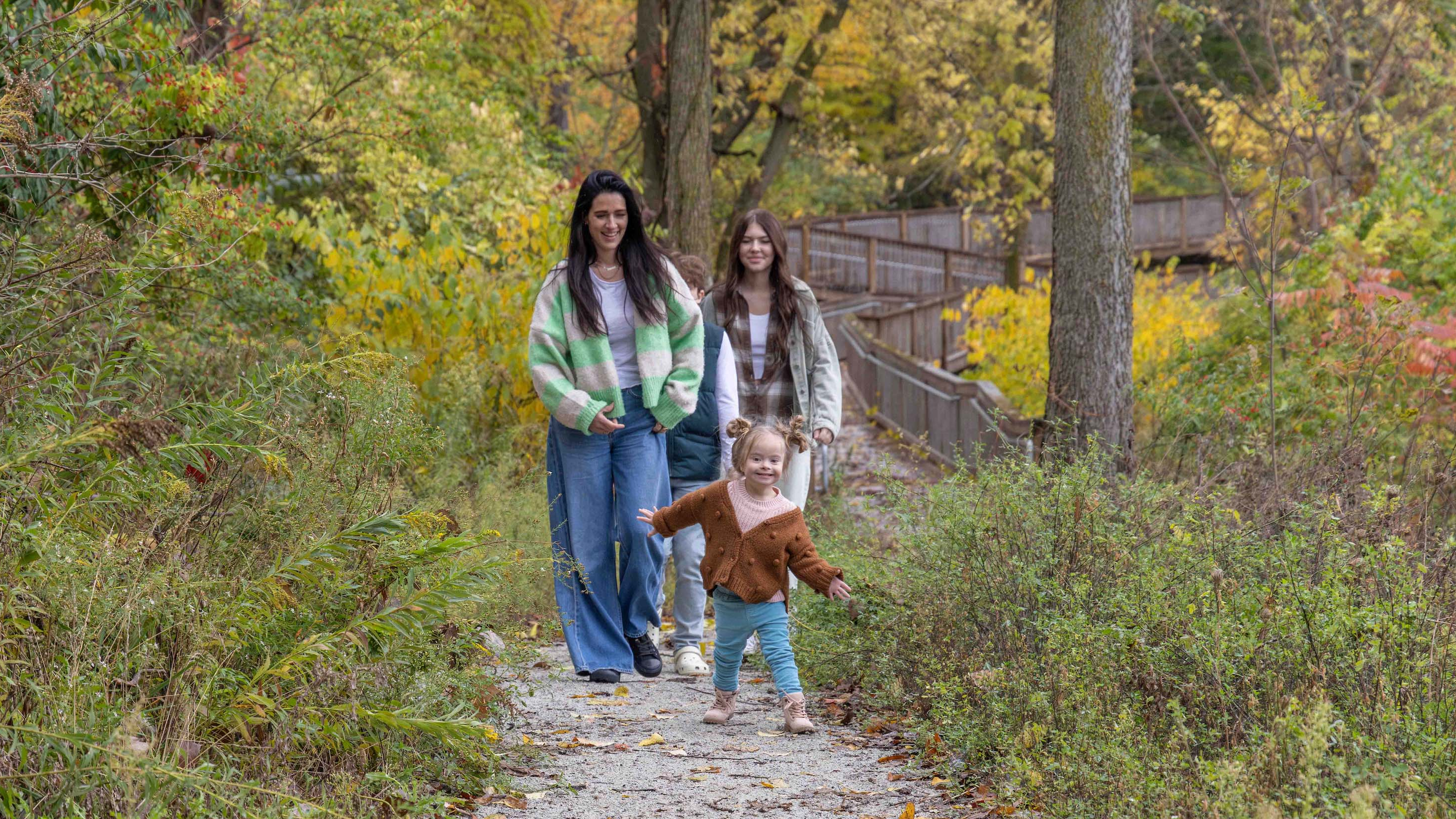 fall family hiking on nature trail