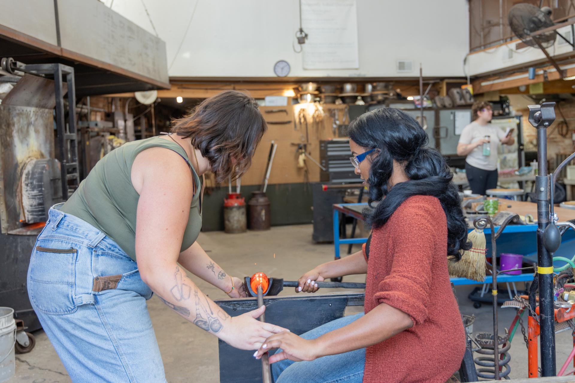 Artists at work at Water Street Glassworks.