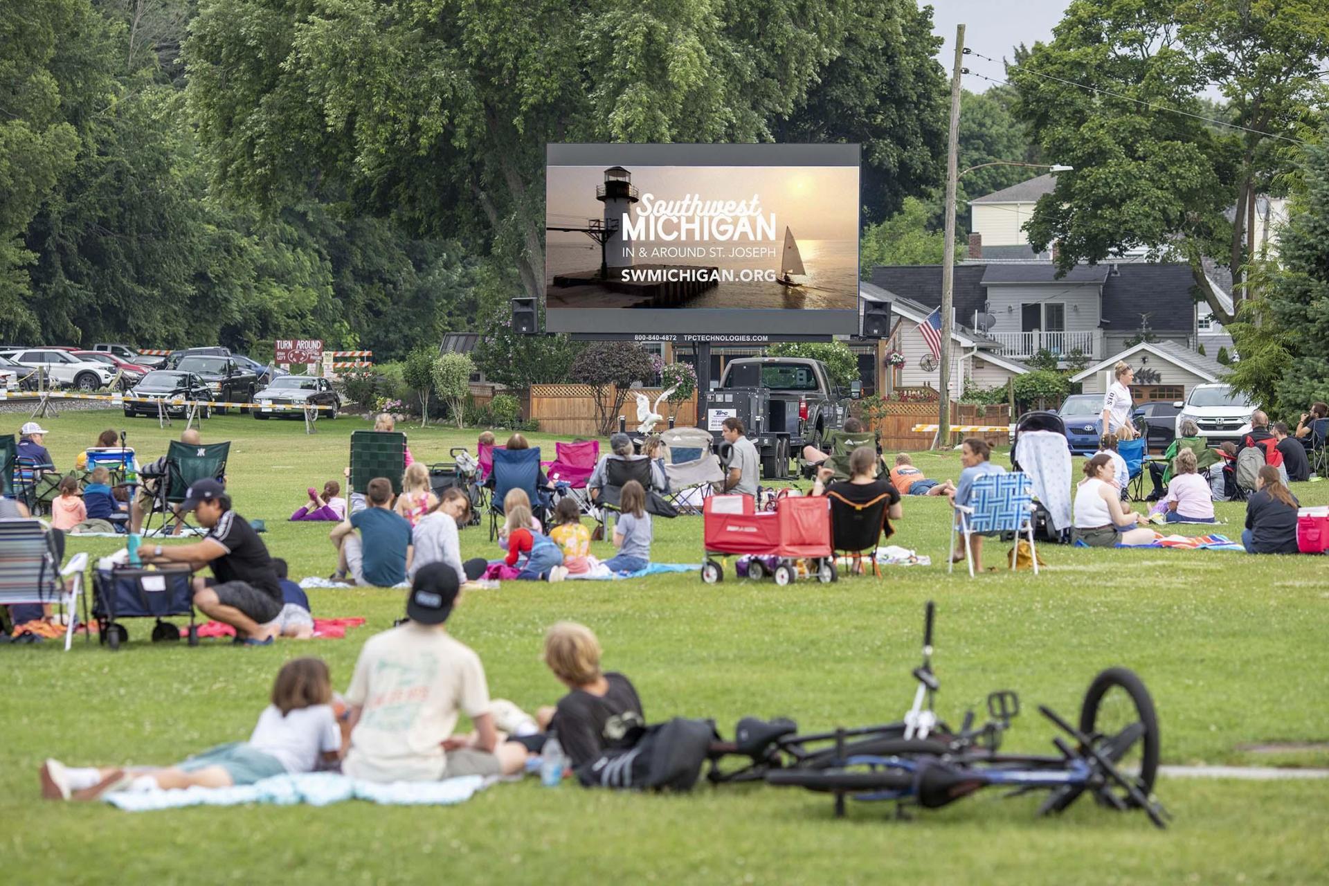 People watching a movie in a park in St. Joseph.