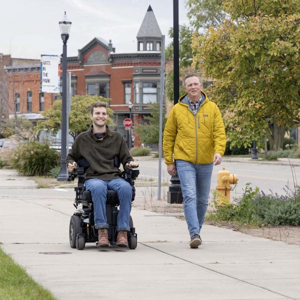 Two people walking in downtown Benton Harbor