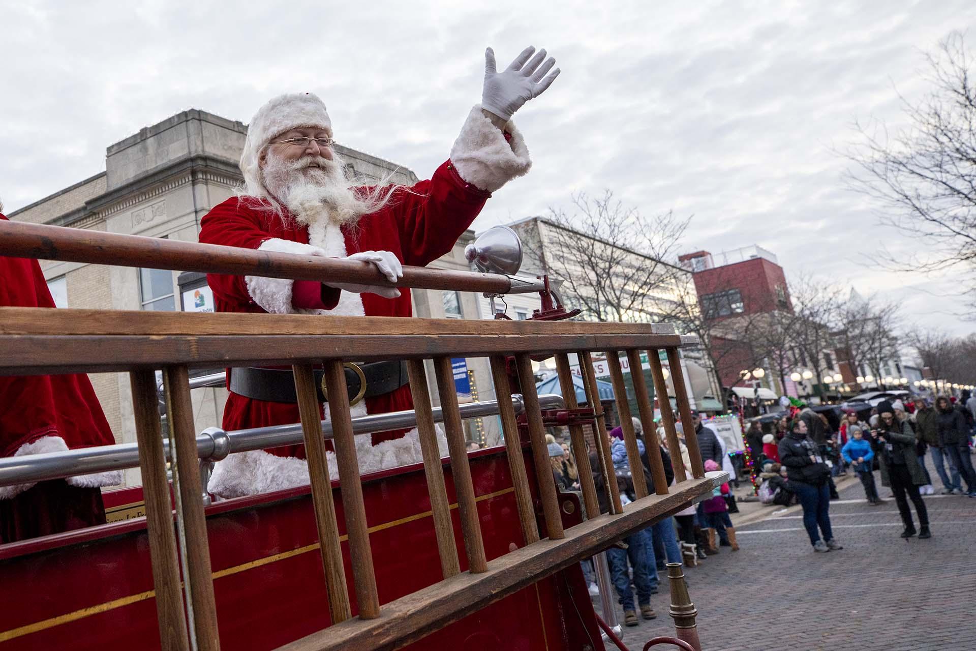 Santa arriving in Saint Joseph on a firetruck. 