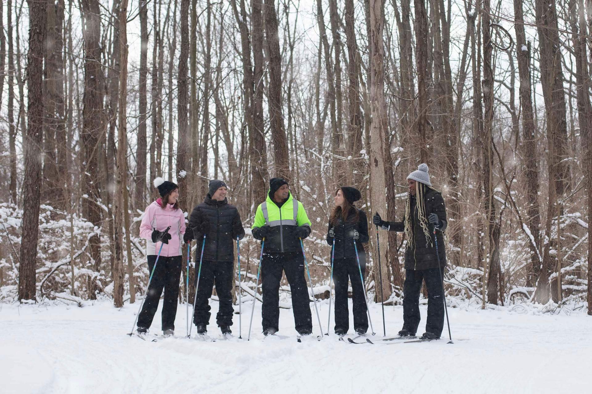 A group of friends cross country skiing at Love Creek.