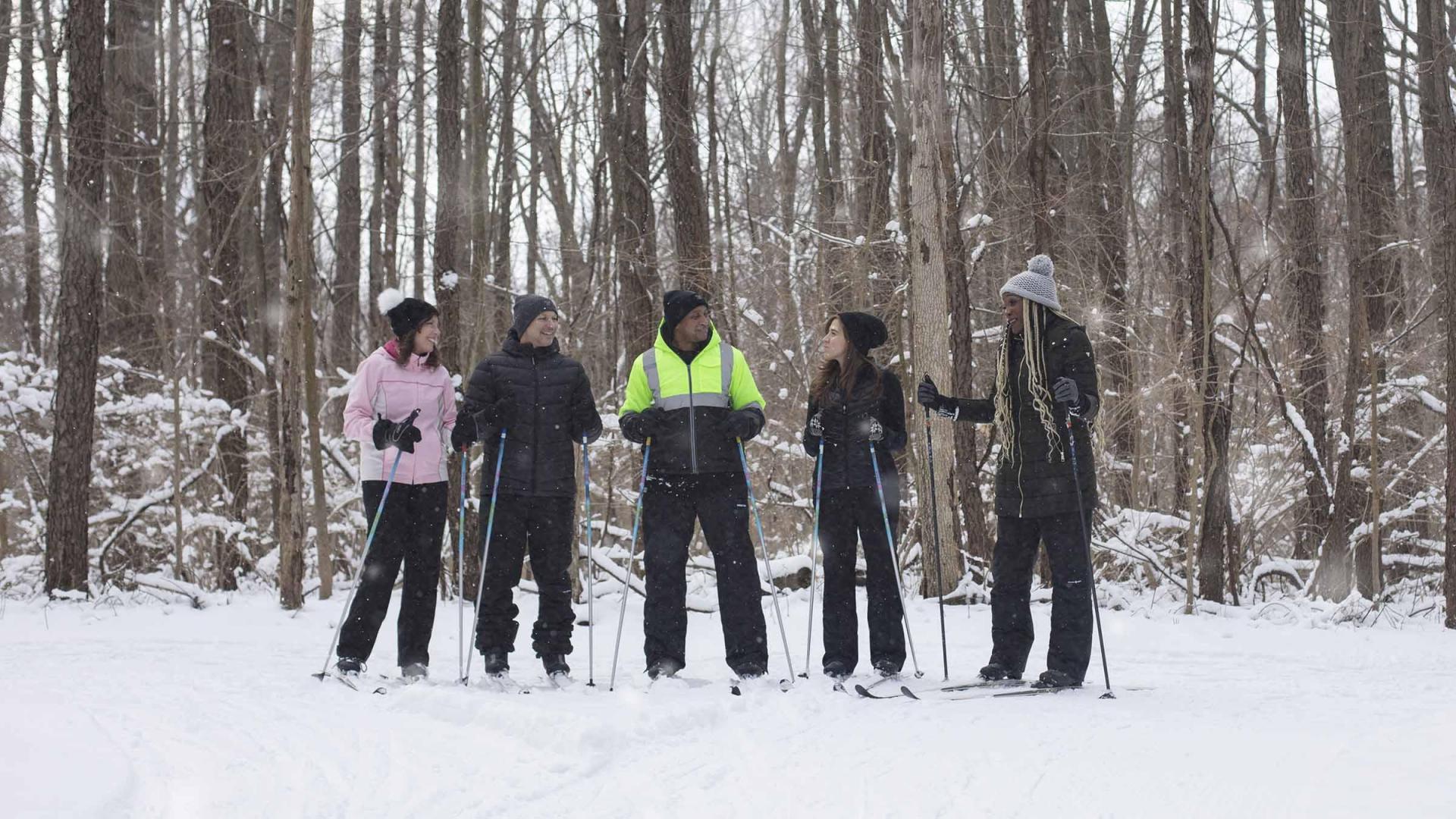 A group of friends cross country skiing at Love Creek.