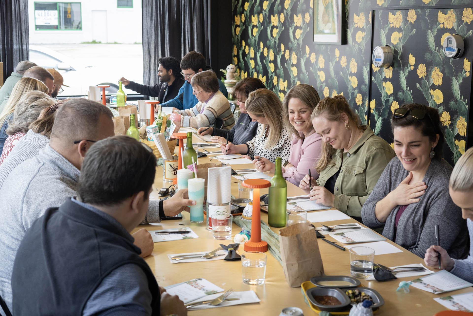 A group of professionals enjoying lunch a the restaurant anemel