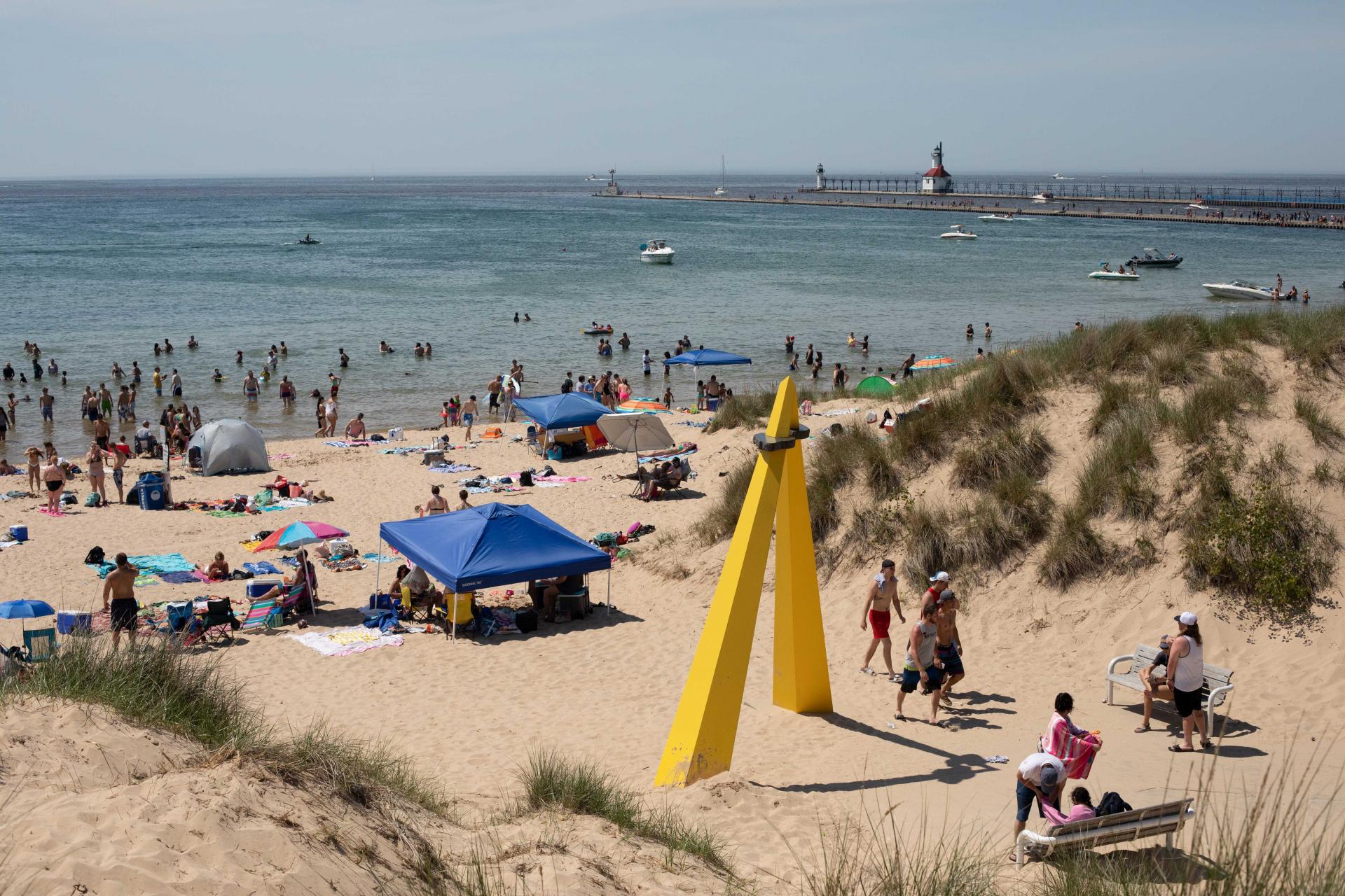 People enjoying summertime at Silver Beach County Park