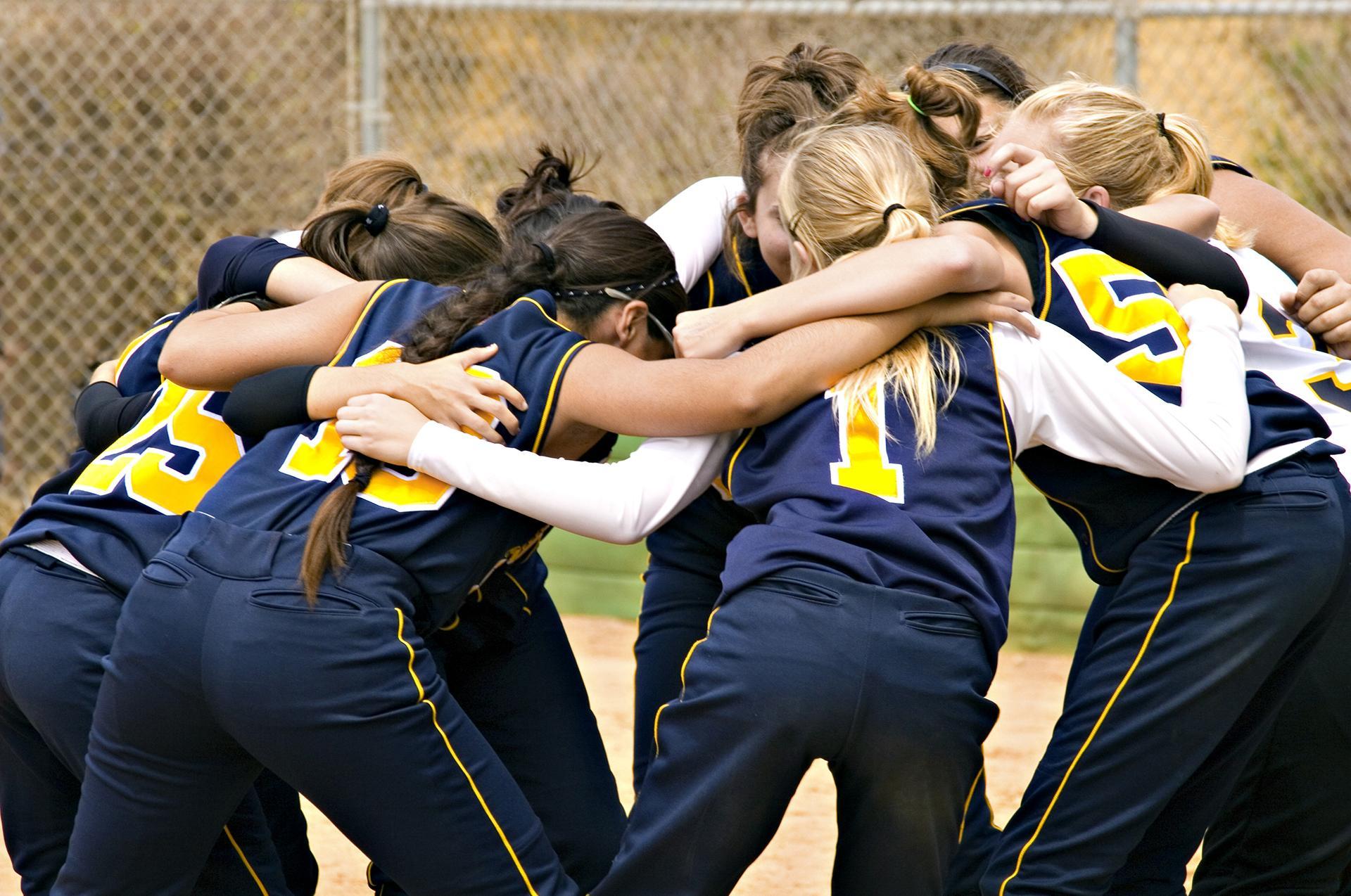 girls team huddle sports softball baseball youth sports