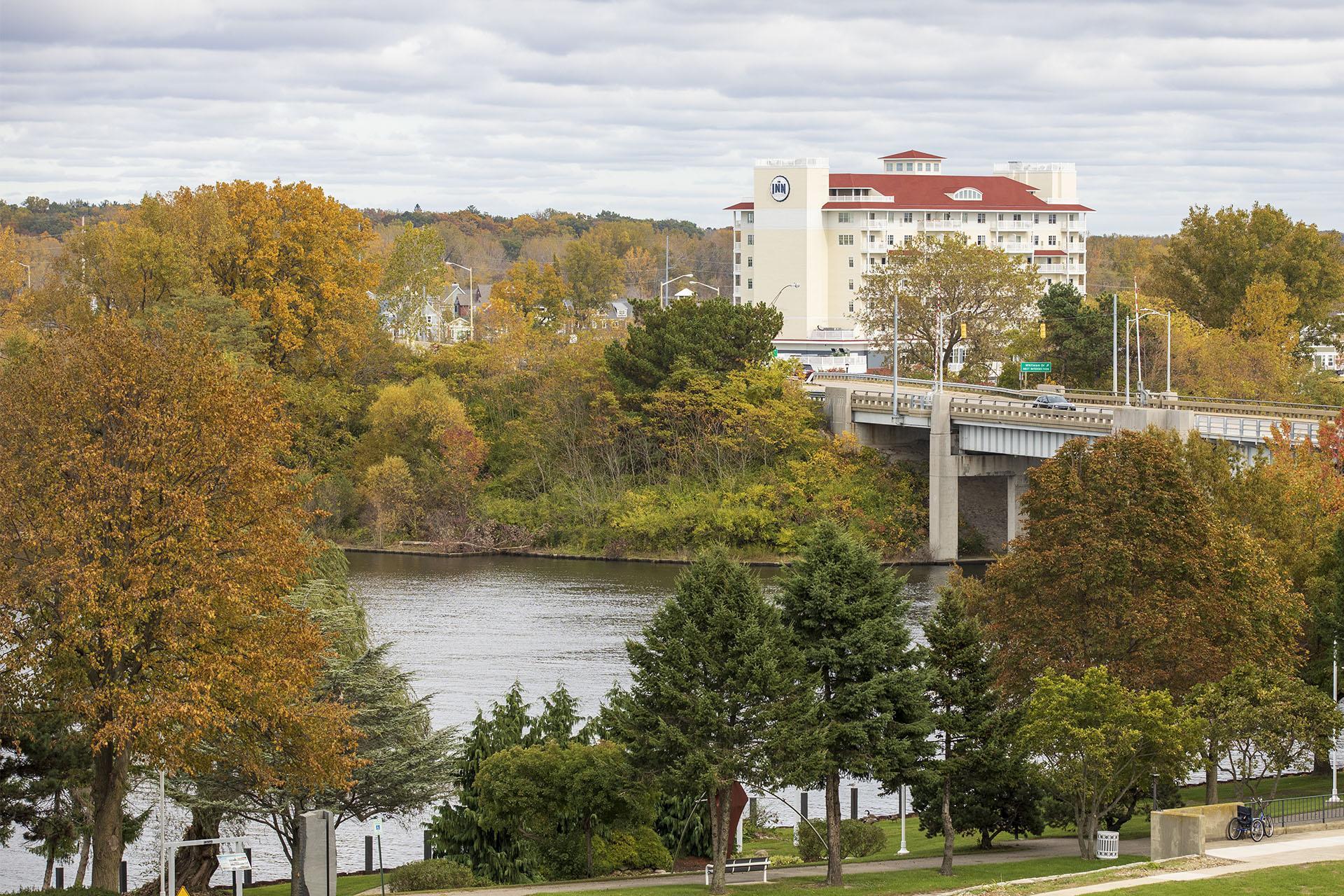 A view of The Inn at Harbor Shores with fall color.