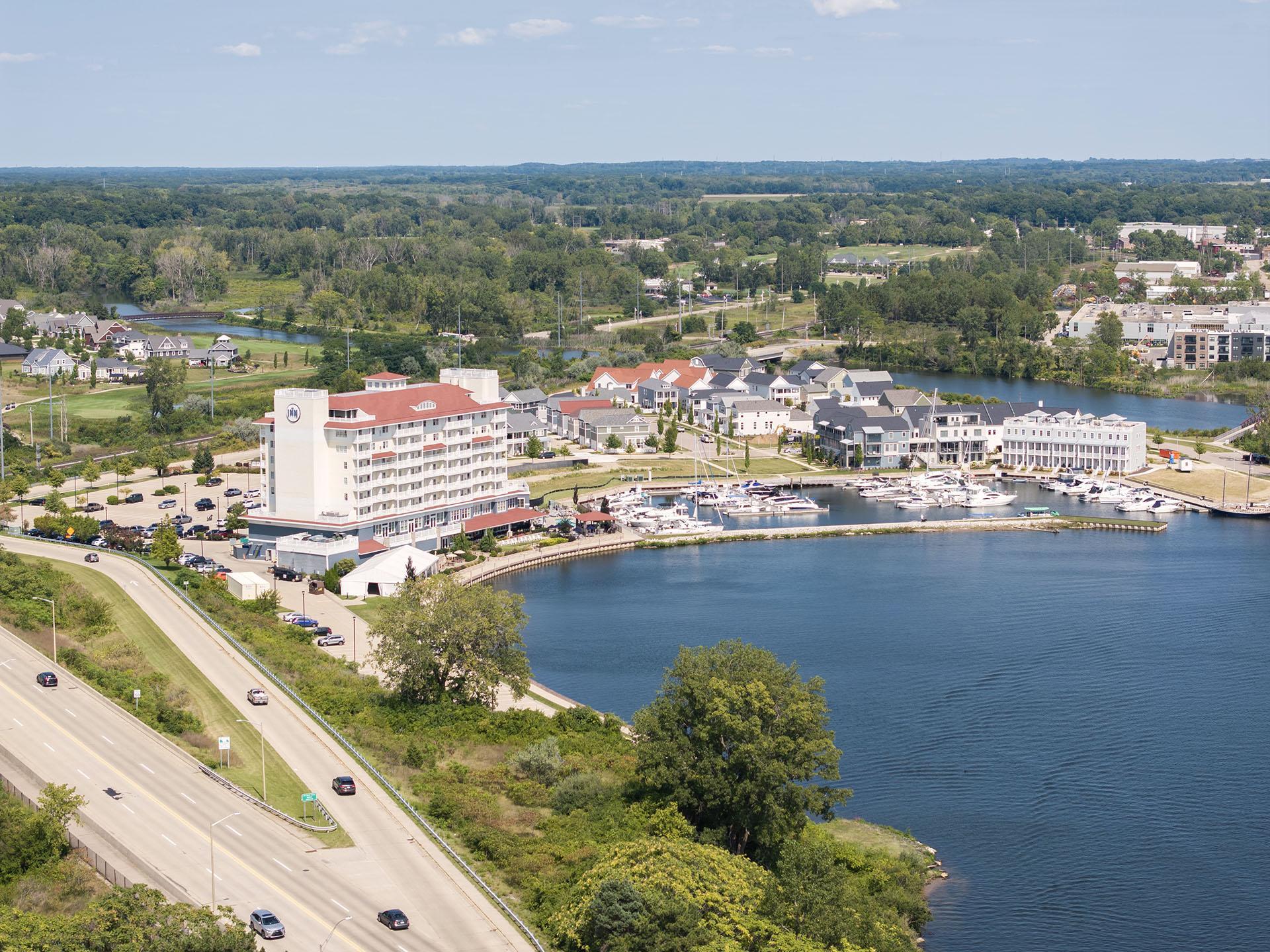 A view of The Inn at Harbor Shores with fall color.