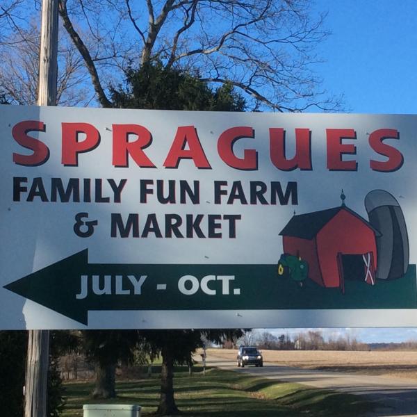 Spragues Family Fun Farm logo and sign