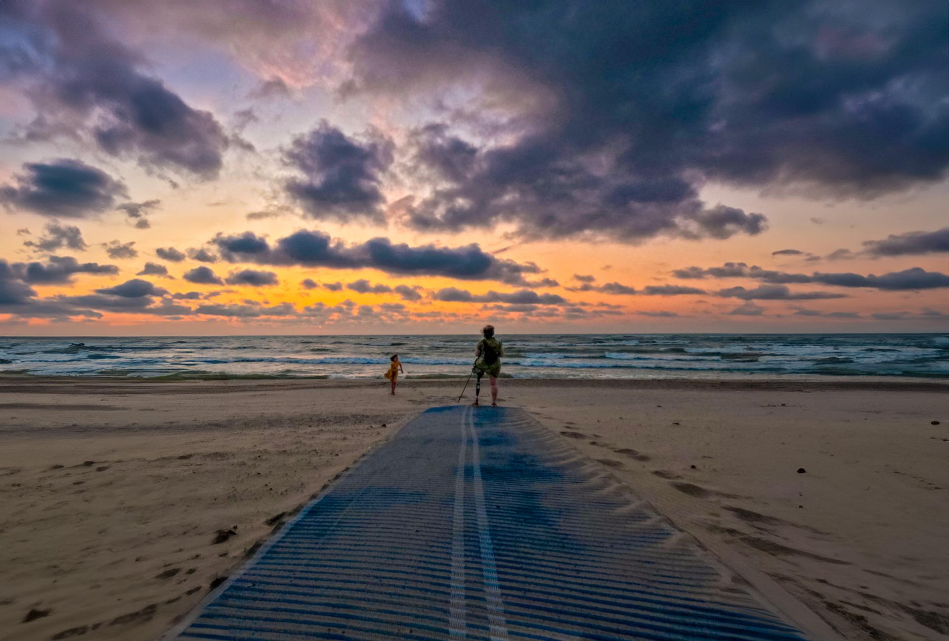 sunset at the beach learners Enjoying Silver Beach and St. Joseph with kids and a mobility disability and makers 