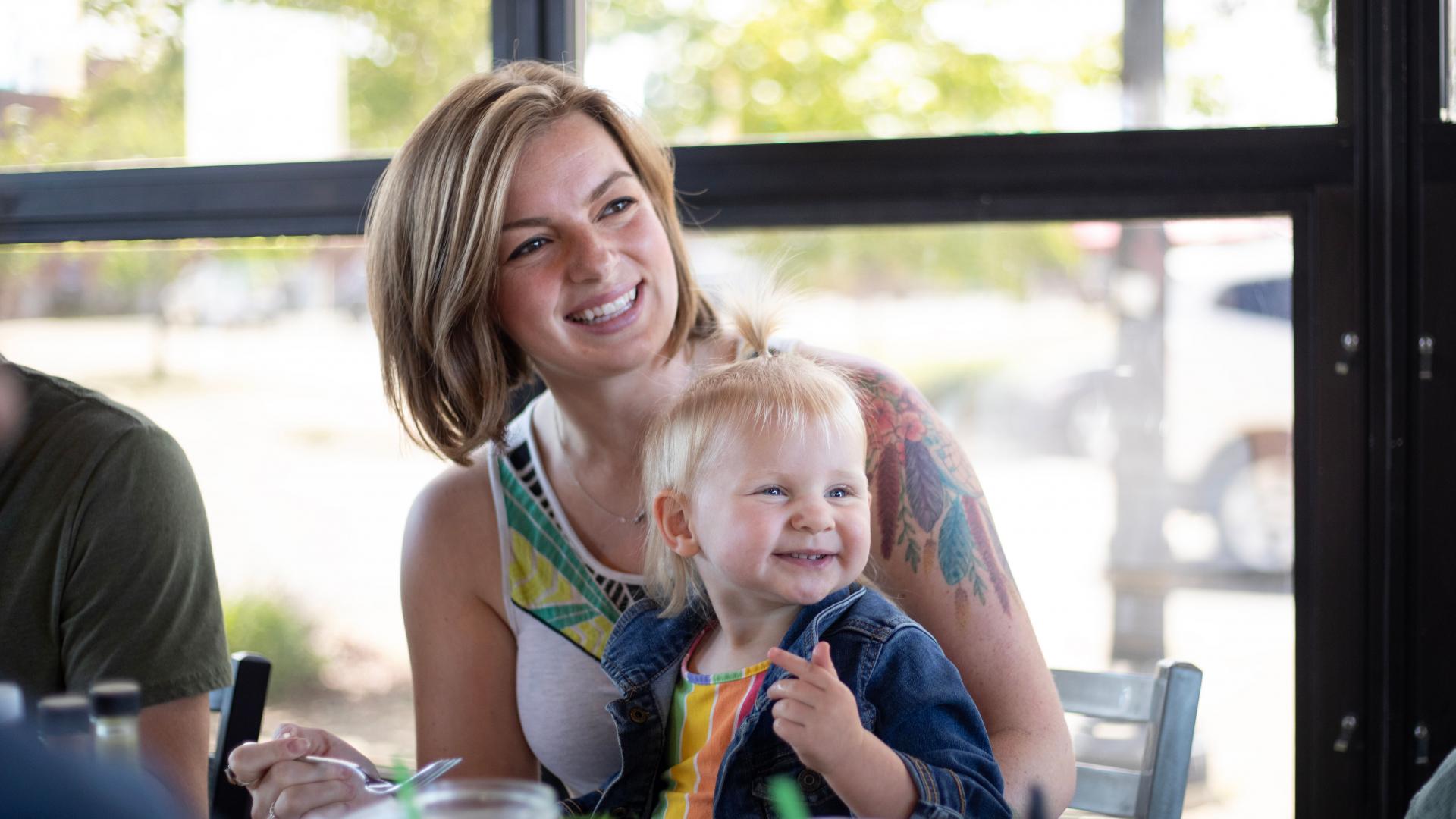 woman and her toddler in a restaurant