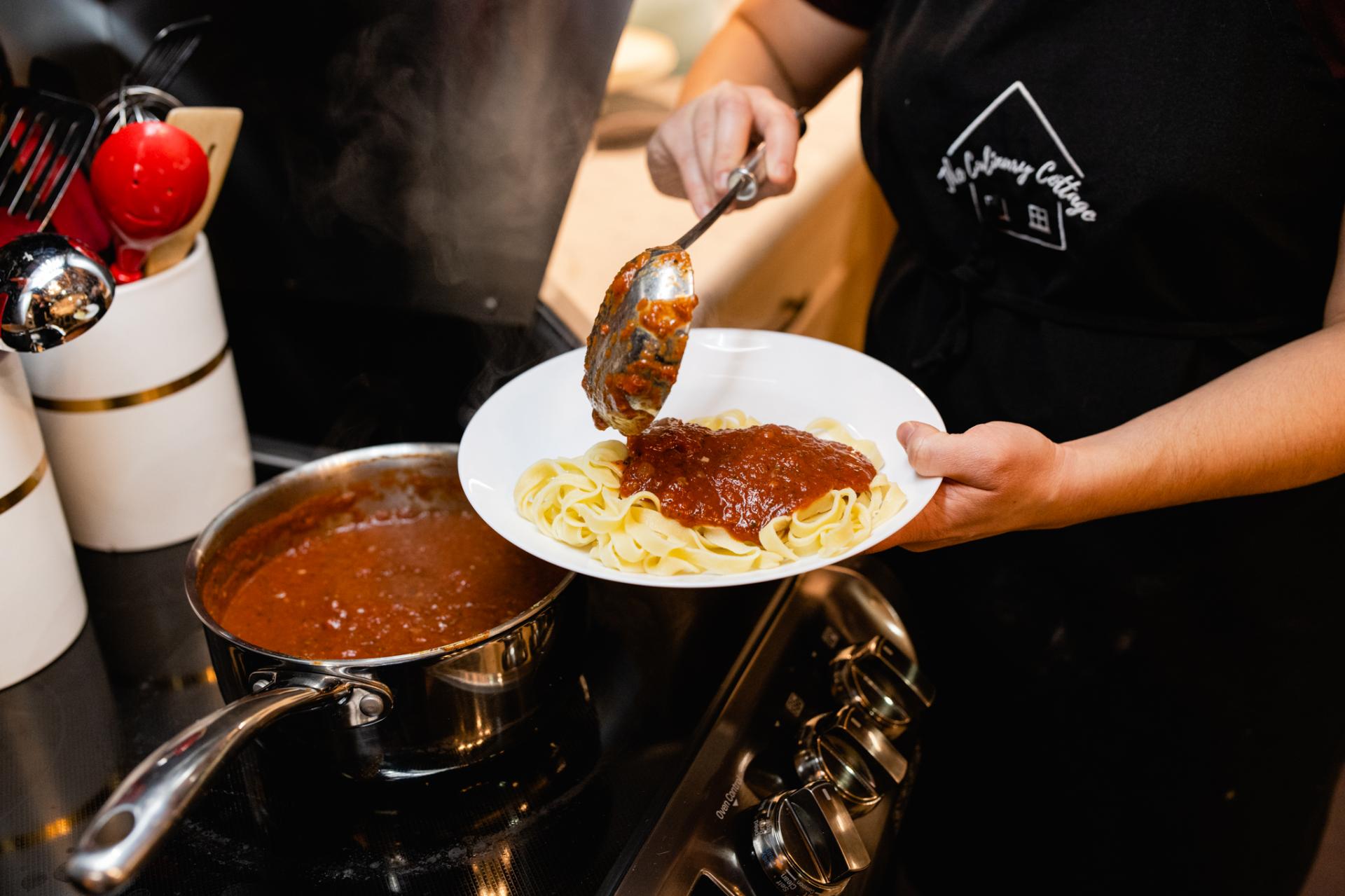 Making pasta during a cooking class