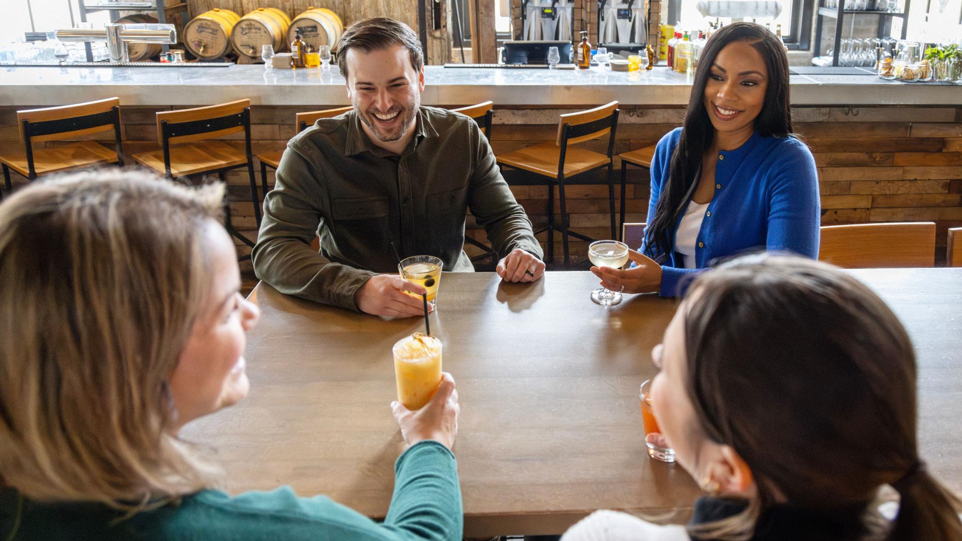 Friends drinking cocktail at Journeyman