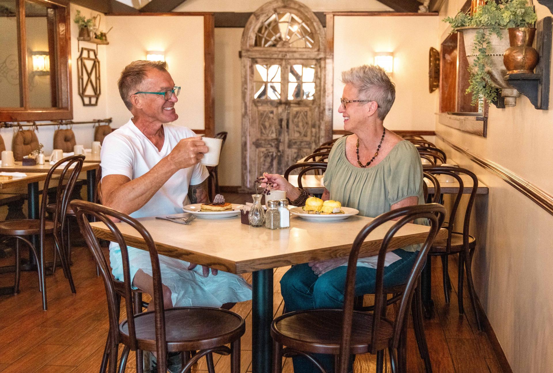 Couple eating breakfast at Copper Pot