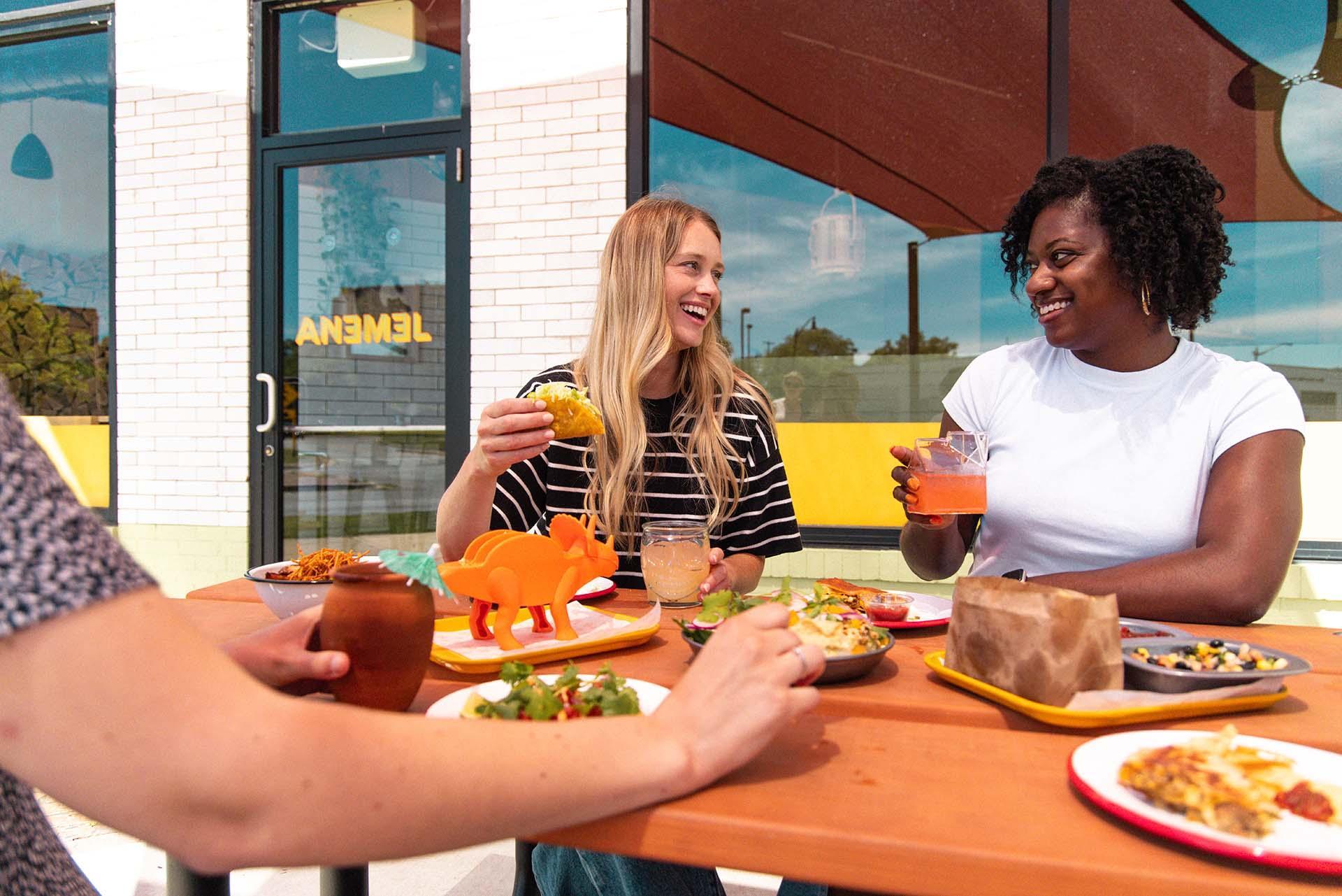 People enjoying a meal at Anemel.