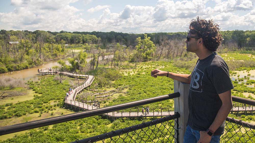 A person enjoying the view from the overlook at Galien River County Park.