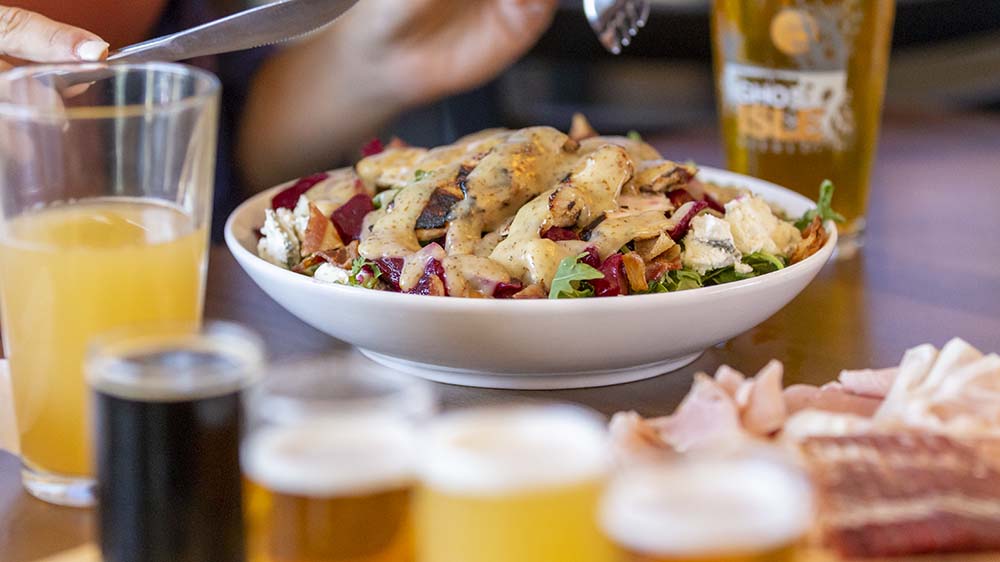 A salad and beer at Ghost Isle Brewery.