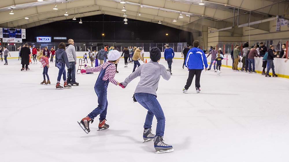 People skaing at the Howard Ice Arena