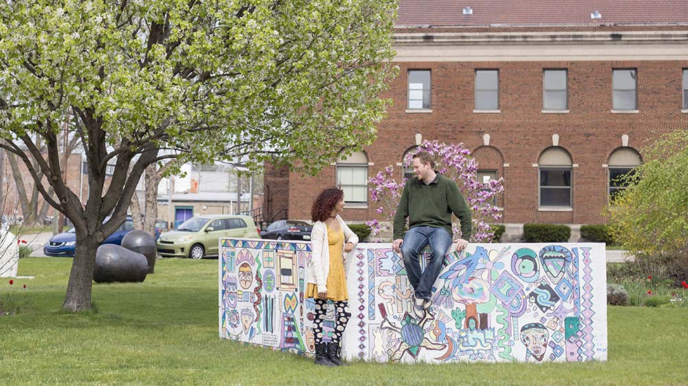 Two people at Arts Park in Benton Harbor